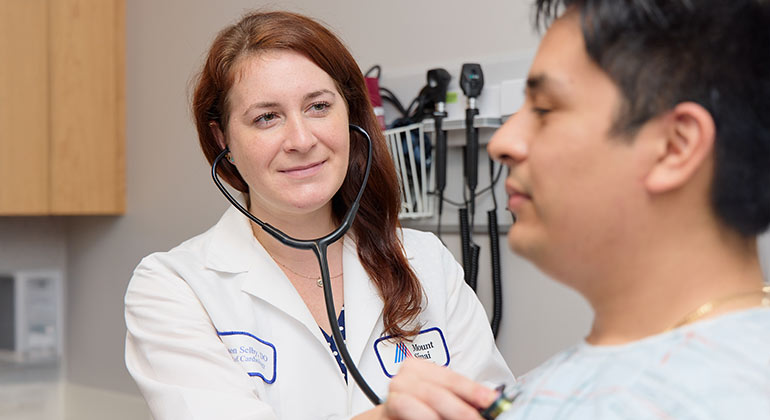 doctor checking patient